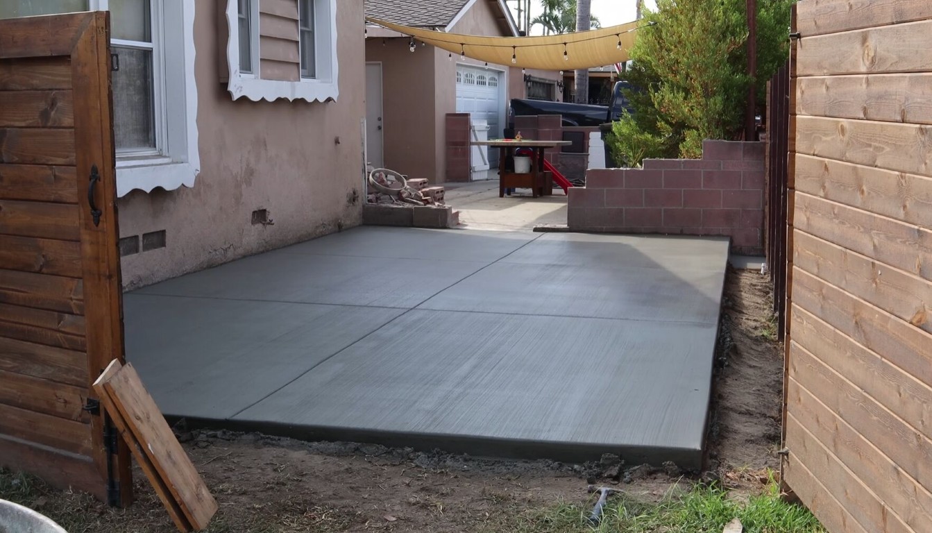 Low maintenance concrete patio installation